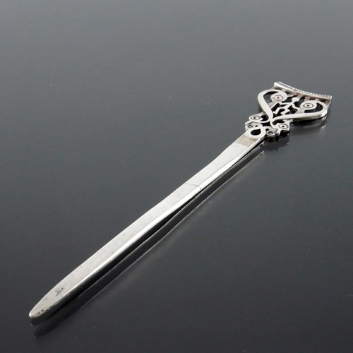 240 - Ola M Gorie, a Scottish Iona style silver letter opener, Orkney, assay Edinburgh 1985, the open term... 