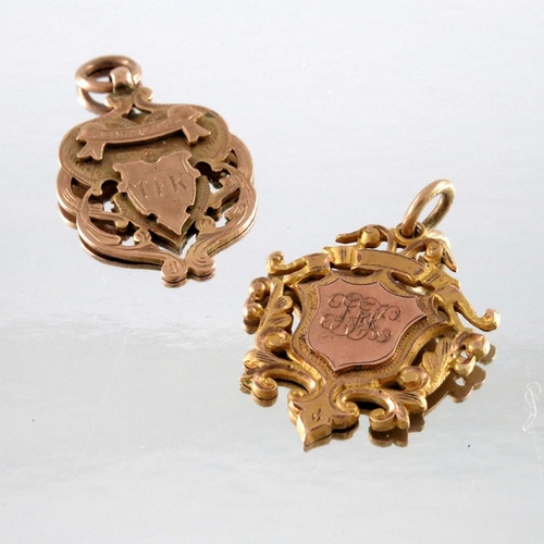 251 - Two 9 carat gold medal fobs or pendants, 4cm long, 15.1g