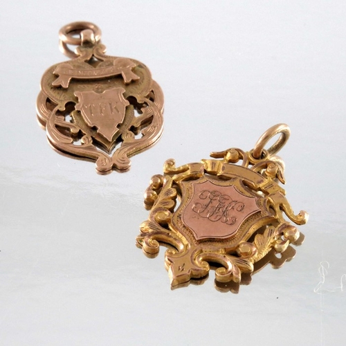 251 - Two 9 carat gold medal fobs or pendants, 4cm long, 15.1g