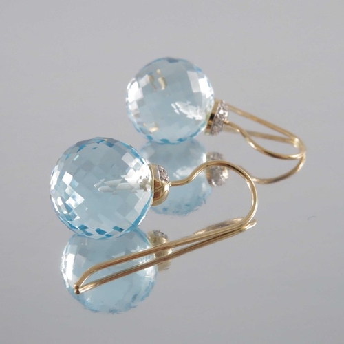 263 - A pair of topaz briolette cut and diamond drop earrings, on 18 carat gold (2)