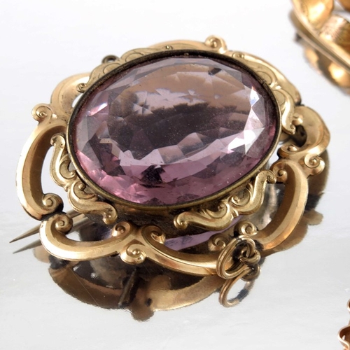 264 - Four Victorian and later yellow metal and gold brooches, including amethyst set and shell cameo exam... 