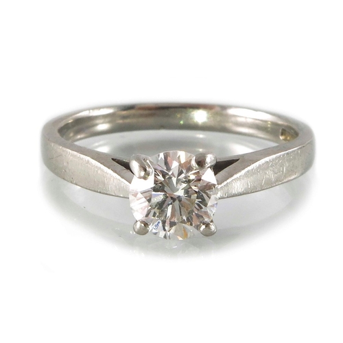 266 - A platinum brilliant-cut diamond single-stone ring, with tapered shoulders, estimated diamond weight... 