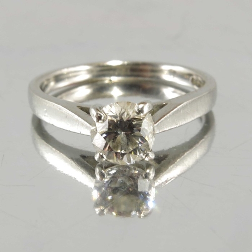 266 - A platinum brilliant-cut diamond single-stone ring, with tapered shoulders, estimated diamond weight... 