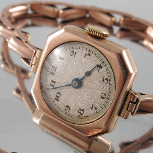 290 - Two 9 carat gold ladies wrist watches, one with square chamfered case, engine turned dials, each on ... 