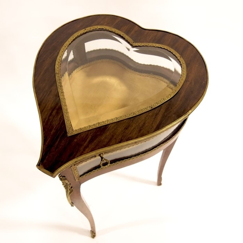 375 - A 19th century Louis XV style heart shaped vitrine, gilt metal mounted, bevelled glass top and sides... 