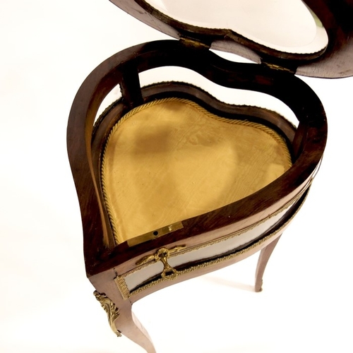 375 - A 19th century Louis XV style heart shaped vitrine, gilt metal mounted, bevelled glass top and sides... 