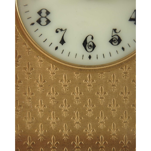 392 - A French gilt brass carriage timepiece, the 1.5 inch cream enamelled dial within an etched fleur de ... 