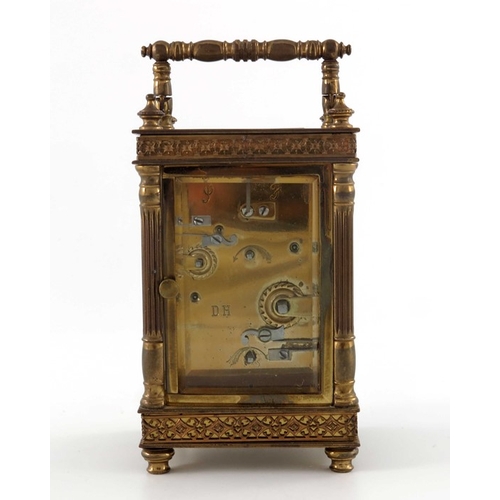 393 - A gilt brass swiss carriage clock, the white enamelled chapter ring and subsidiary dial with Roman n... 