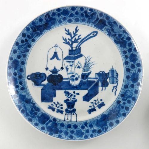 398A - Four Chinese export blue and white plates, 18th century, variously painted with temple landscapes an... 