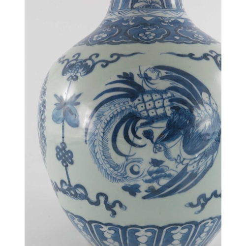 401 - A Chinese blue and white bottle vase, ovoid shouldered form with shaft neck, painted with alternatin... 