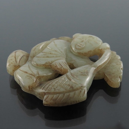 412 - Four Chinese carved jade pendants, some reticulated, including an incised ring medallion, figures an... 