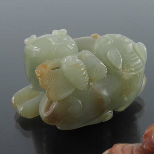 418 - Two Chinese jade and hardstone carvings, including man with peach branch, entwined dogs with insect,... 