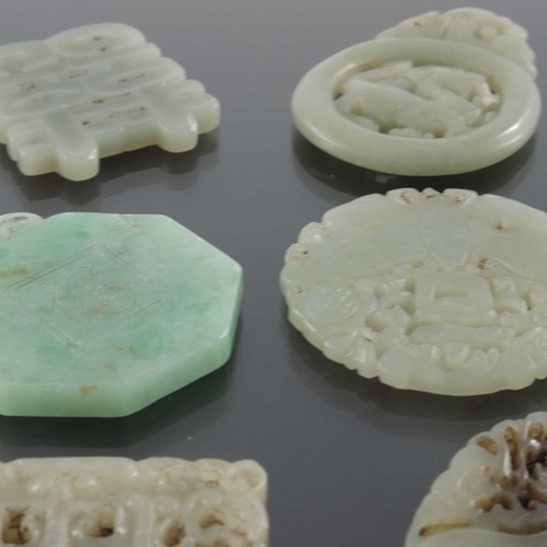 419 - Six Chinese carved jade pendants, some reticulated, including dragon, insect and floral designs, 6.5... 