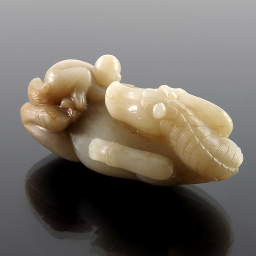 420 - A Chinese jade carving, in the form of a supine horse with monkey, 9cm