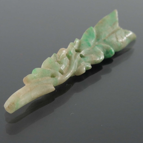 422 - Three Chinese carved jade pendants, together with a silver and marcasite jade ring and a carved ring... 