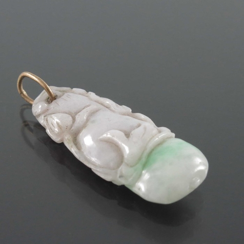 422 - Three Chinese carved jade pendants, together with a silver and marcasite jade ring and a carved ring... 