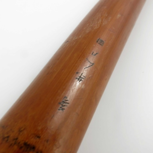 425 - A Japanese carved bamboo cane, Meiji, decorated in the round with battling Samurai, signed, 89cm lon... 