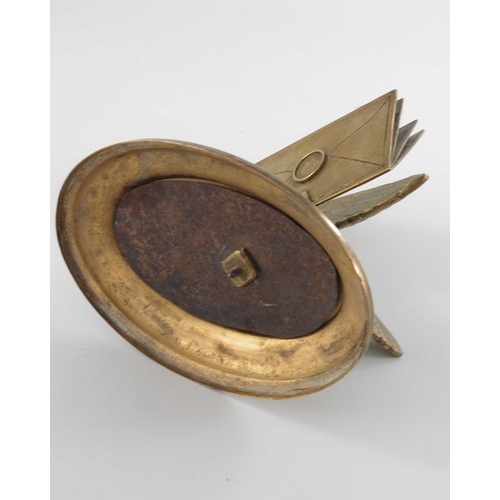 470 - A gilt brass figural letter holder, 19th century, modelled as a bird with beak full of letters, on a... 