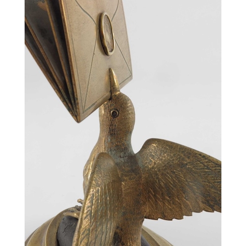 470 - A gilt brass figural letter holder, 19th century, modelled as a bird with beak full of letters, on a... 