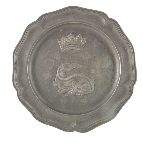 471 - Two pewter plates, 18th century style, embossed in relief with the porcupine and salamander emblems ... 