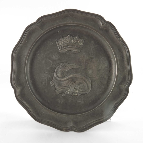 471 - Two pewter plates, 18th century style, embossed in relief with the porcupine and salamander emblems ... 