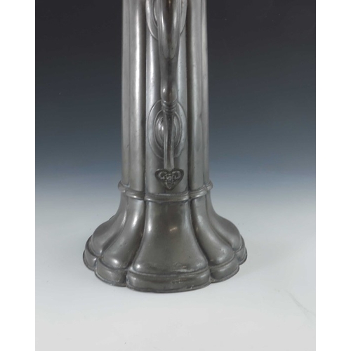 472 - A Victorian Gothic Revival pewter flagon, James Dixons & Sons, slender tapering form raised on sprea... 