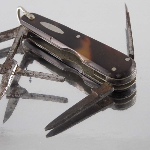 478 - A Victorian steel and tortoiseshell combination penknife, Sheffield circa 1880, including two knives... 