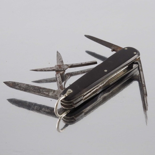 478 - A Victorian steel and tortoiseshell combination penknife, Sheffield circa 1880, including two knives... 