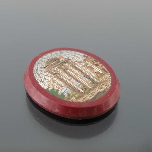 480 - A micro mosaic plaque of the Temple of the Dioscuri, Rome, inlaid in red hardstone, 2.5cm x 2cm