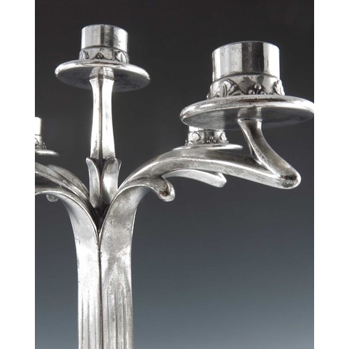 504 - Imperial Zinn, a Jugendstil silver plated five light candelabrum, the square section fluted column t... 