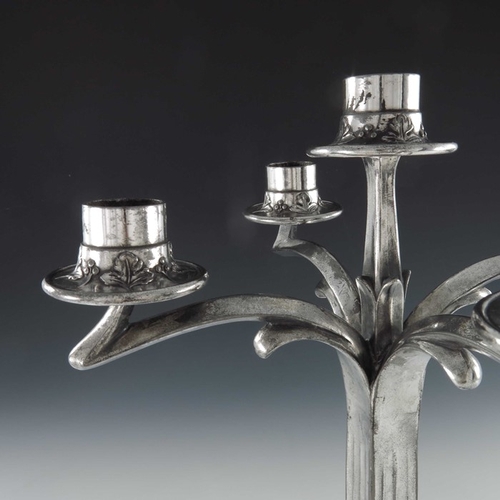 504 - Imperial Zinn, a Jugendstil silver plated five light candelabrum, the square section fluted column t... 