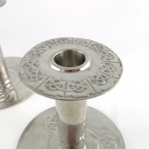 510 - Archibald Knox for Liberty and Co., a pair of Arts and Crafts Tudric pewter candlesticks, model 08, ... 