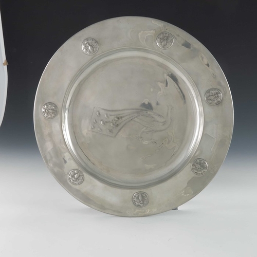 511 - C V A Voysey (attributed) for Liberty and Co., an Arts and Crafts Tudric pewter charger, model 0114,... 