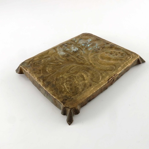 519 - W H Mawson for Keswick School of Industrial Arts (attributed), an Arts and Crafts brass tray, repous... 