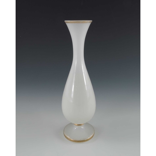 539 - Baccarat (attributed), a French white opaline glass vase, 19th century, footed elongated baluster fo... 