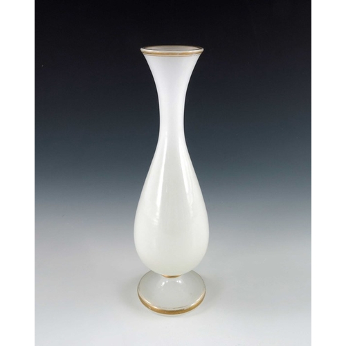 539 - Baccarat (attributed), a French white opaline glass vase, 19th century, footed elongated baluster fo... 