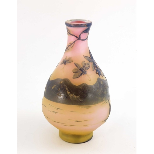 555 - Emile Galle, a cameo glass landscape vase, circa 1905, purple over yellow and pink, flattened balust... 