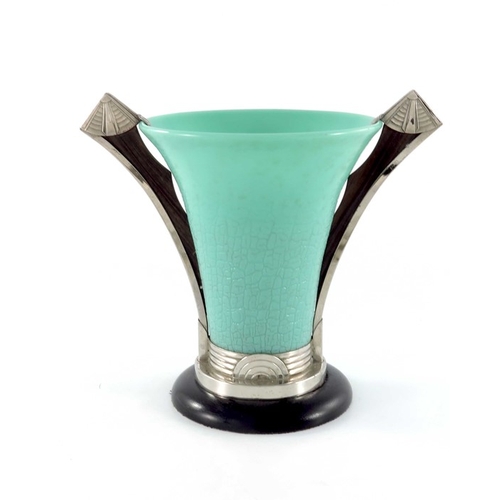 557 - An Art Deco moulded glass, chrome and macassar vase, circa 1930, the trumpet shaped leather textured... 