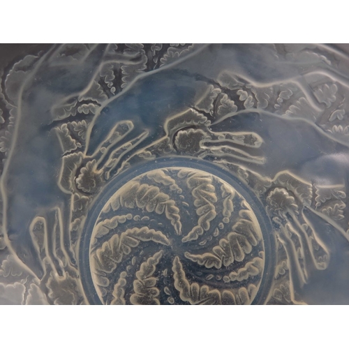 569 - Rene Lalique, a Chiens glass bowl, model 3214, designed circa 1921, blue opalescent, moulded R Laliq... 