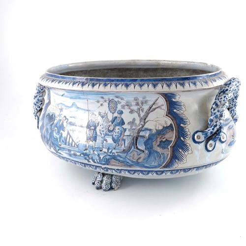 578 - A Delft probably French Nevers blue and white manganese cistern or wine cooler, of oval bombe form, ... 