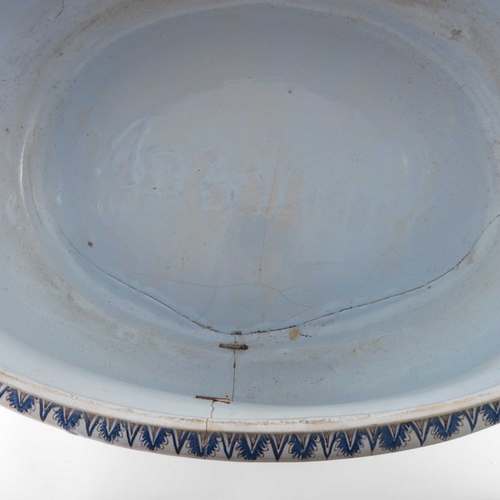 578 - A Delft probably French Nevers blue and white manganese cistern or wine cooler, of oval bombe form, ... 