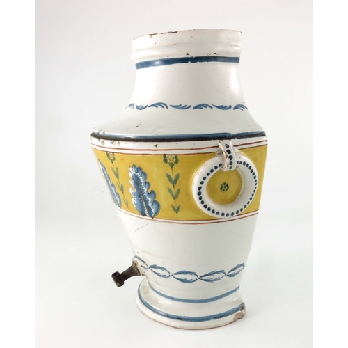 579 - A Continental faience wall hanging syphon, circa 1790, twin handled half urn form with metal tap, pa... 