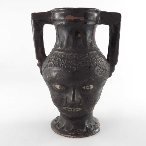 580 - An Attic style janiform kantharos, twin handled Classical urn vase form, relief moulded with African... 