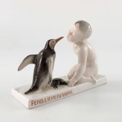 598 - Ferdinand Liebermann for Rosenthal, a figure group of boy, penguin and crab, model 34, designed circ... 