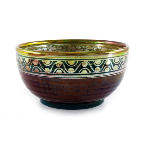 656 - Charles Cundall for Pilkington, a Royal Lancastrian lustre bowl, 1909, the exterior with a sang de b... 