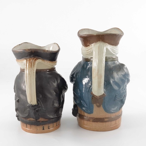 666 - Harry Simeon for Doulton Lambeth, two graduated stoneware XX Toby jugs, modelled seated on barrels, ... 