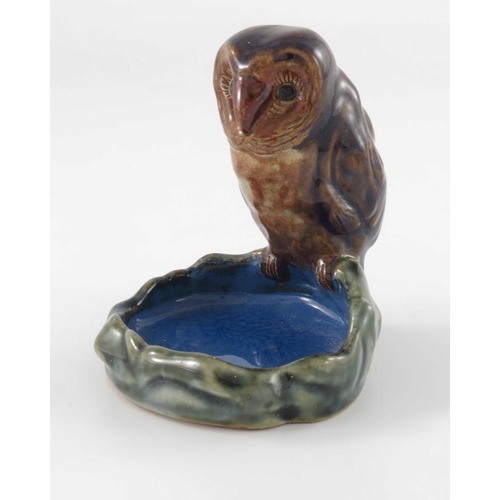 674 - Harry Simeon for Doulton Lambeth, a stoneware bibelot, modelled as an owl on the edge of a pond, 10c... 