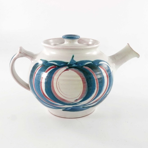 701 - Edgar Campden for Aldermaston Pottery, a studio pottery teapot, tin glazed and painted with turquois... 