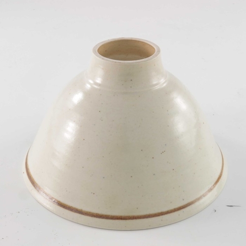 702 - David Lloyd Jones (1928-1994), a studio pottery bowl, ogee conical form, oatmeal glazed, the interio... 