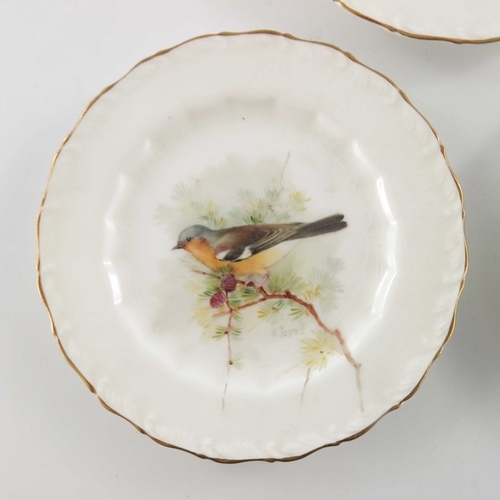 718 - W Powell for Royal Worcester, three small bird painted plates, 1917, decorated and titled Gold Finch... 